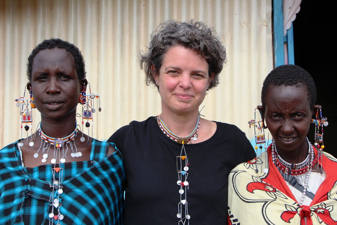 Chiara (centre) posing for a snapshot with caregivers of children with disabilities in Kajiado.